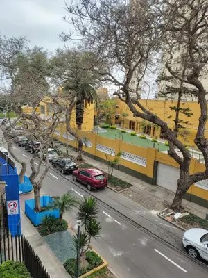 a view of a street with cars parked on the road at Bella vista al malecón Lima - Miraflores in Lima