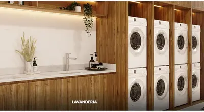 a laundry room with four washer and dryer machines at Moderno Departamento con Terraza, cerca a la Playa in Lima