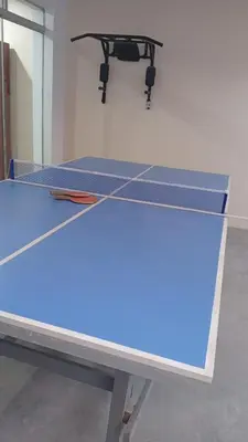 a ping pong table in a room at Departamento amoblado y comodo in San Vicente de Cañete