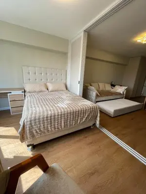 a bedroom with two beds in a room at Mini Apartment Ares 2 in Lima