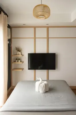 a bedroom with a bed with a swan toy on it at Mario Vera Chavez in La Molina