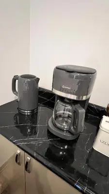 a coffeemaker sitting on top of a kitchen counter at Private Whole Apartment in Surco close to Barranco in Lima