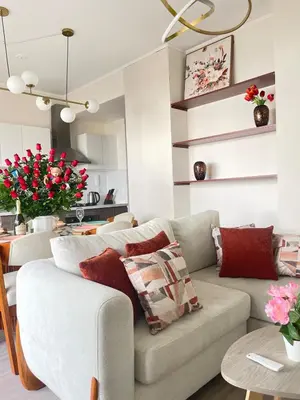 a living room with a couch and a table at LimaeStays Exclusive penthouse in downtown Barranco in Lima