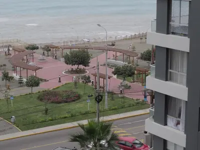 a view of the beach from a building at Panoramic View in Lima