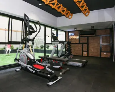 a gym with two treadmills and a treadmill at Nice Department Full Equip in Barranco - Gym, Pool in Lima
