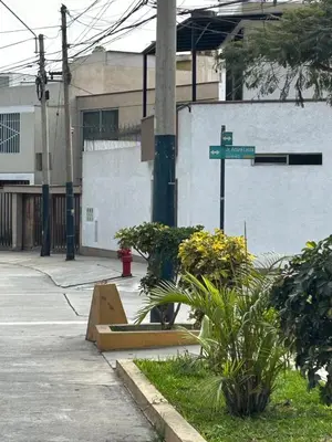 a street sign on the corner of a street at Flat between Barranco, Miraflores & Surco in Lima
