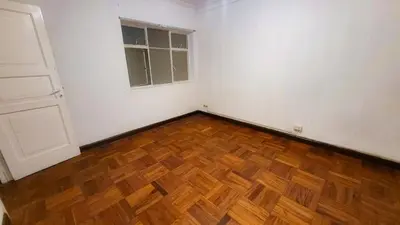 an empty room with a wooden floor and a window at Comfy Rooms in a Cozy House - Miraflores in Lima