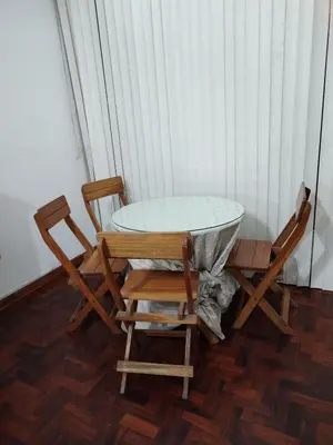 a table and two chairs sitting next to a table at Miraflores Cozy Private Apartment with ocean view in Lima
