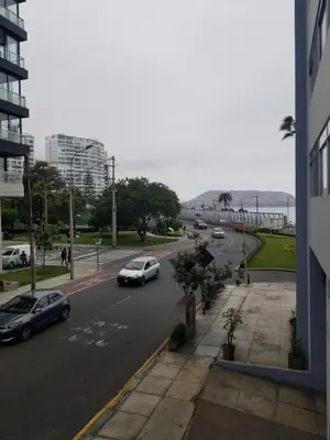 a view of a street with cars on the road at Miraflores Cozy Private Apartment with ocean view in Lima