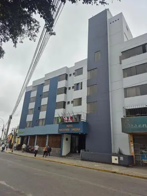 a building with a crane on top of it at Hotel Naciones Unidas in Lima