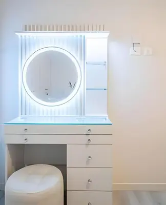 a dressing table with a mirror and a stool at The Urban Loft in San Miguel in Lima