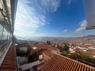 a view of a city from the roof of a building at Cusco and Rock in Cusco