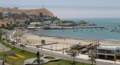 a beach with a body of water and a harbor at 4th Youth Loft Private Open Terrace Close Beach in Lima