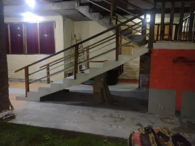 a staircase inside of a building with a door at Cozy Rural House in Apata - Jauja
