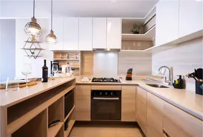 a kitchen with white cabinets and a stove top oven at Art&U Apartments by Vibrant in Lima