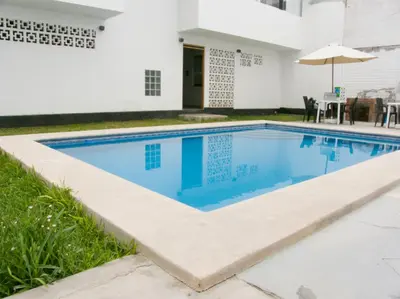 a swimming pool in the backyard of a house at Apartment with Beach Exit 201 in Punta Negra