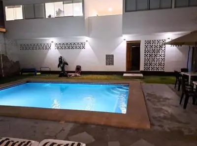 a large swimming pool in the middle of a house at Apartment with Beach Exit 201 in Punta Negra