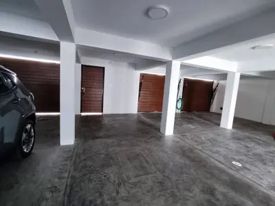an empty parking garage with a car parked in it at Apartment with Beach Exit 203 in Punta Negra