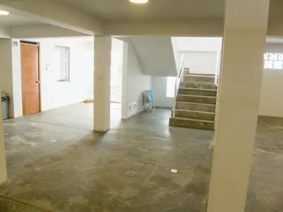an empty room with stairs in a building at Apartment with Beach Exit 203 in Punta Negra