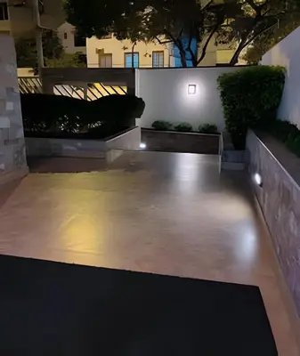 a courtyard with lights in a building at night at SM3 Habitación pequeña con baño privado/Miraflores in Lima