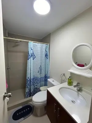 a bathroom with a sink and a toilet and a mirror at Dpto entero 2 dormitorios 2 baños máximo 5 personas in Lima
