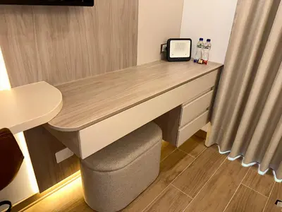 a desk with a phone on top of it in a room at Ama Loft Miraflores in Lima