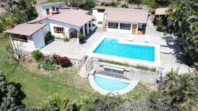 an aerial view of a house with a swimming pool at Casa Huerta Vista Bonita in Canta