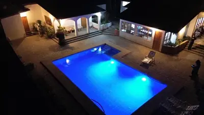 an overhead view of a swimming pool at night at Casa Huerta Vista Bonita in Canta