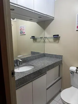 a bathroom with a sink and a toilet at Three-bedroom apartment in San Miguel in Lima