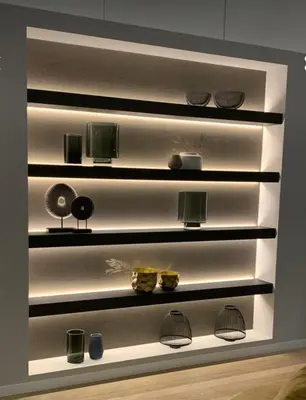 a shelf with various items on it in a room at Modern and Cozy appartment in Lima