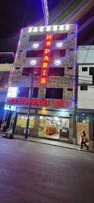 a building with a sign on the side of it at Hostal Paris 3 Visita Lima con excelente ubicación, wifi gratis y vistas en in Lima