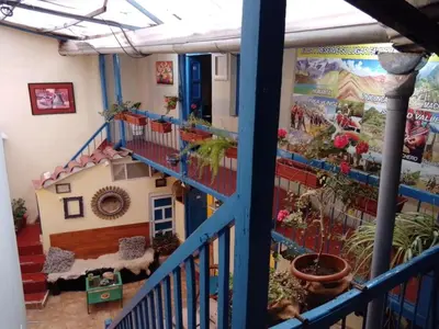 a view from the balcony of a house with plants at Casa Margarita in Cusco