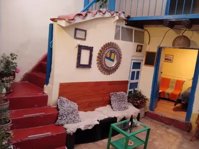 a model of a house with a stair case at Casa Margarita in Cusco