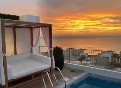 a view of the ocean from the balcony of a hotel at Lovely Ocean View Apartment 1512 in Lima