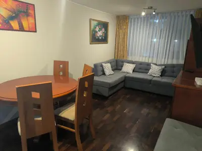 a living room with a couch and a table at Like a Home - Barranco in Lima