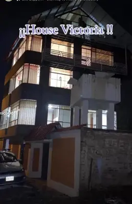 a building with a sign on the side of it at VICTORIA HOUSE - Huancayo - Hualhuas in Hualhuas