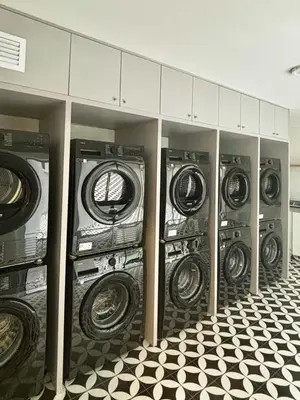 a bunch of washing machines in a room at New and modern flat in Barranco & Miraflores in Lima