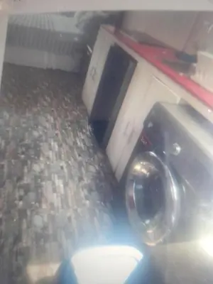 a washing machine in a room with a floor at Miraflores Effyciency 5to piso in Lima