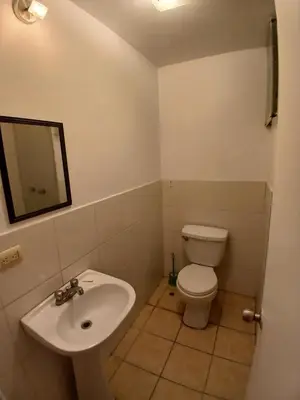 a bathroom with a sink and a toilet at Apartamento Ideal en Zona Céntrica in Lima