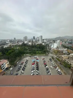 an aerial view of a parking lot with cars at Luxury Duplex on the 15th Floor with Terrace in Lima