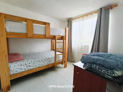 a bedroom with two bunk beds and a window at Casasol in Santa Rosa