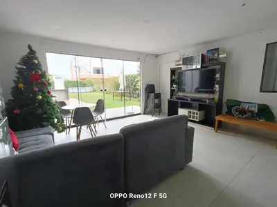 a living room with a couch and a christmas tree at Casasol in Santa Rosa