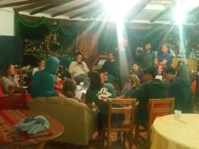 a group of people sitting in a room at EColodge Ccatan in Urubamba