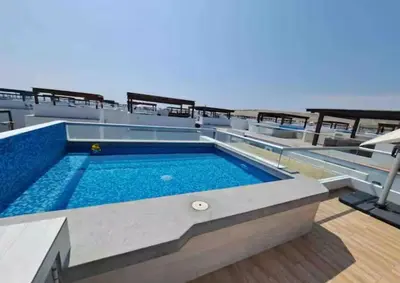 a swimming pool on top of a cruise ship at Beach House in Asia, Santorini Condominio in Asia