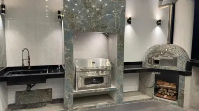 a kitchen with a stove and a sink and a oven at Casa de Campo Las Siete Gotas - Cieneguilla in Cieneguilla