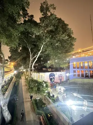 a view of a street at night with a building at Private cinema & comfort in cultural Barranco in Lima