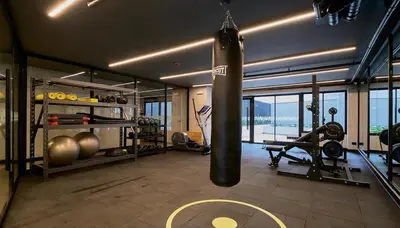 a gym with a punching bag hanging in a room at Apartment in the center of Miraflores Larco in Lima