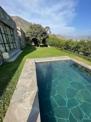 a swimming pool in the yard of a house at Country House in Azpitia Villa las Leñas in Santa Cruz de Flores