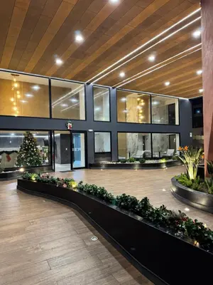 a lobby with a christmas tree in a building at Amalfi Apartment 612 Malecón de la Avenida Costanera in Lima