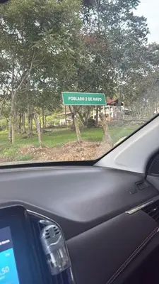 a car windshield with a sign that reads polands be hung at Cabaña BellaVista in Oxapampa